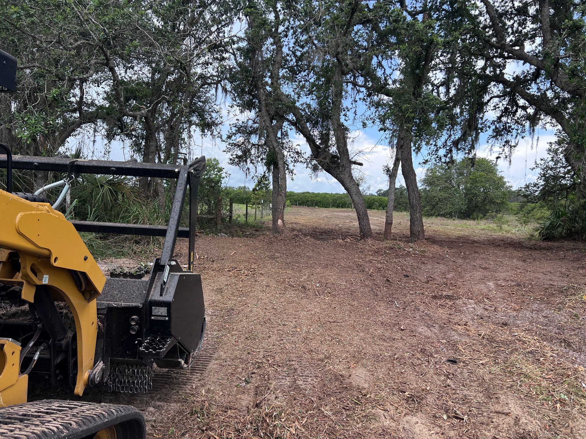 Red Track Loader — Dade City, FL — Stealth Mulching