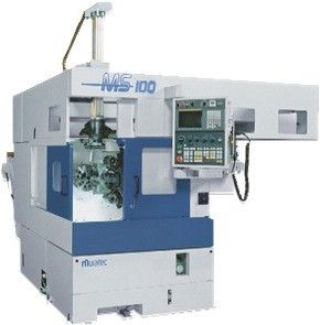 A Machine on Top of A White Surface.