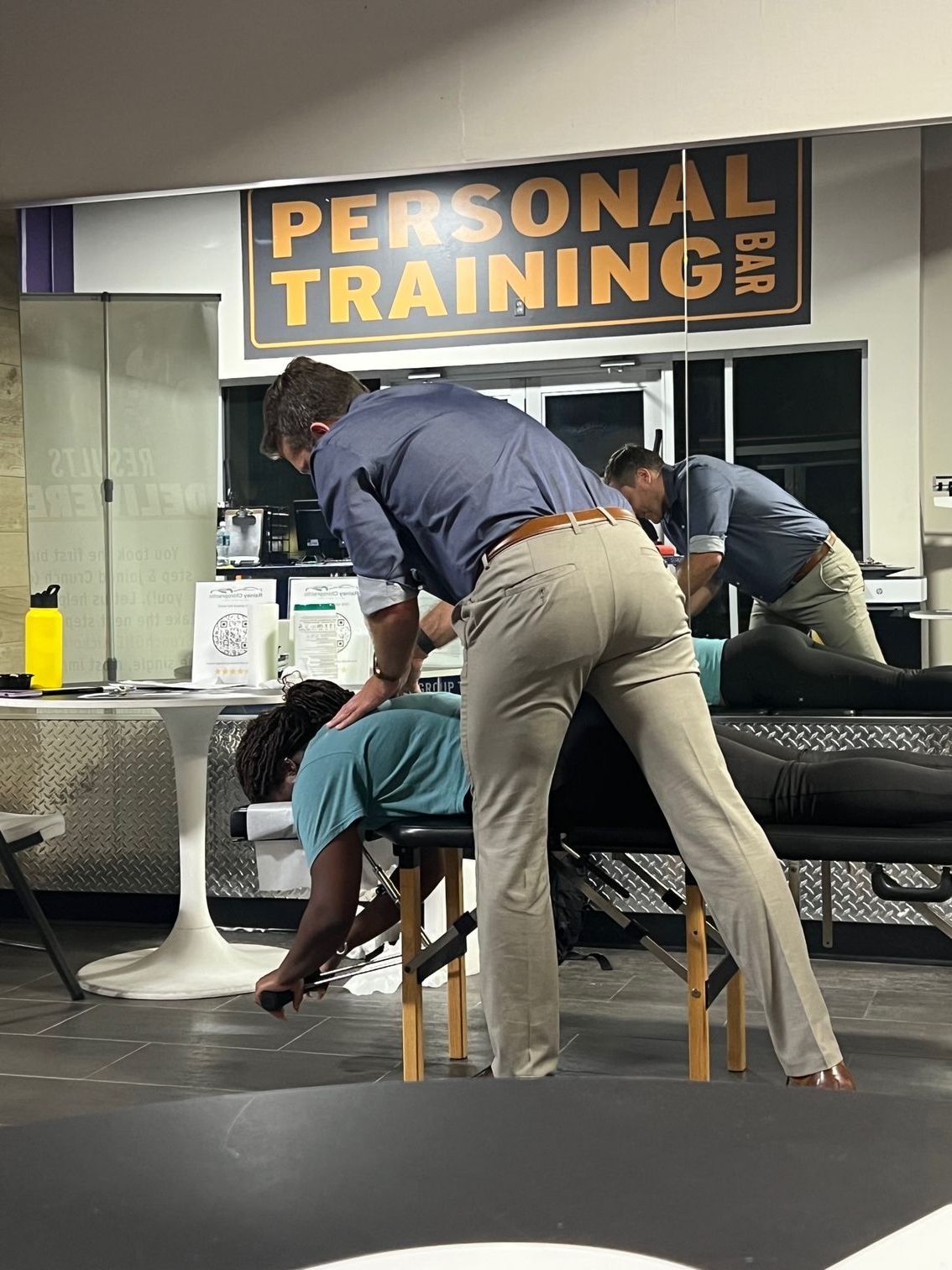 Chiropractic shoulder adjustment.