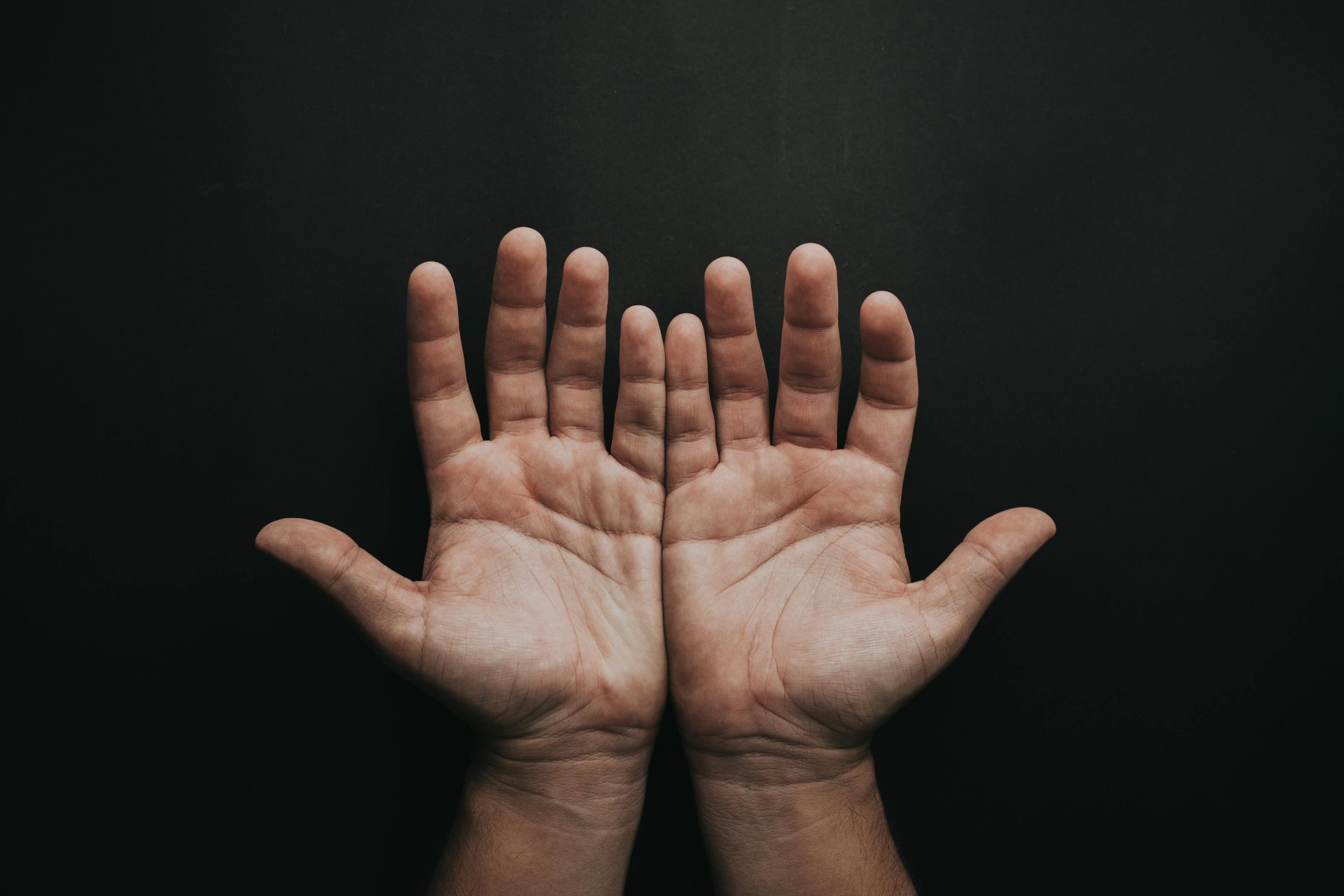 A pair of hands palm up