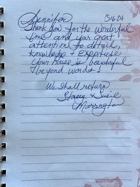 A handwritten note in a notebook says jennifer thank you for the wonderful time and your great attention to detail