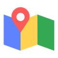 Red location marker pin on a colorful, folded map; blue, yellow, and green sections.