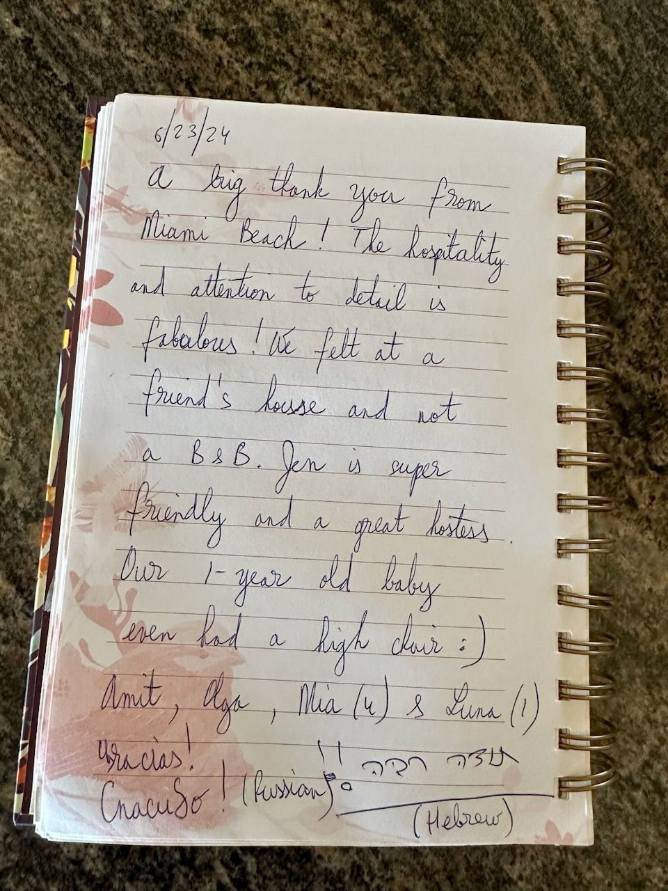 A notebook with a lot of writing on it