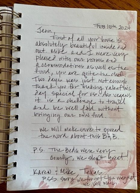 A notebook with a letter written in cursive on it