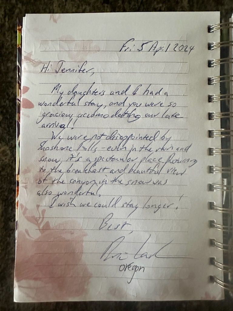 A close up of a notebook with handwriting on it