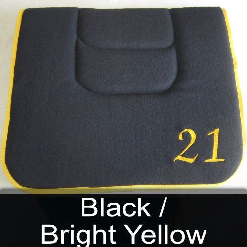 A black cushion with the number 21 embroidered on it