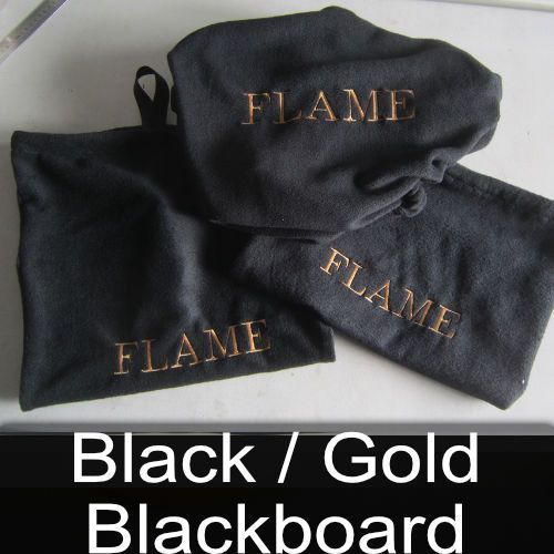 A black and gold blackboard with the word flame on it