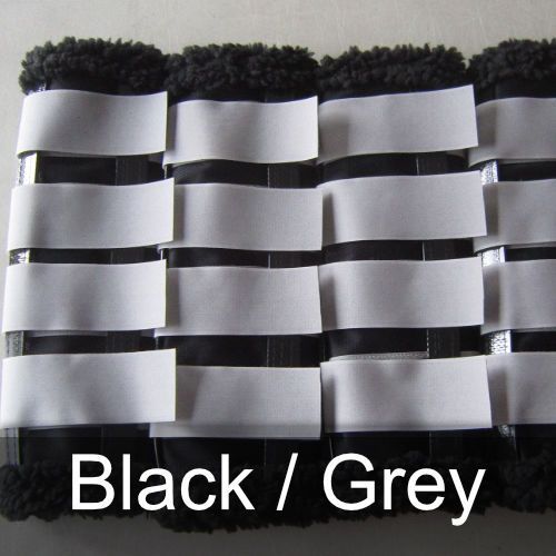 A black and white striped item with the words black / grey below it