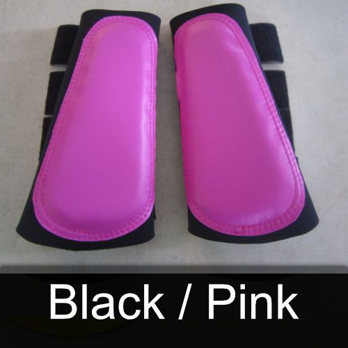 A pair of pink and black boots that say black / pink