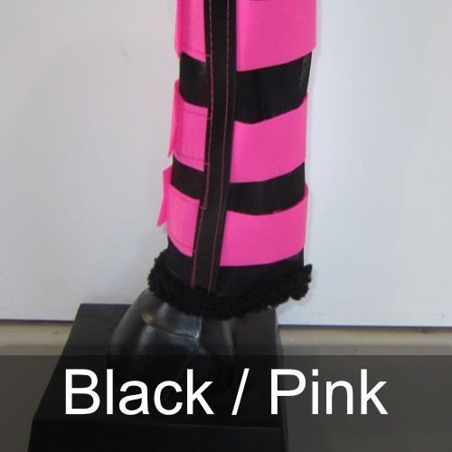 A pair of pink and black leg wraps on a horse