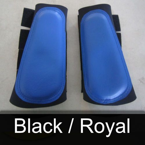 A pair of blue boots that say black / royal