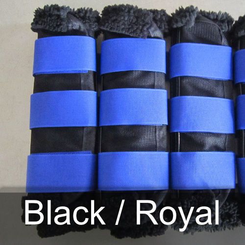 A row of black and blue boots with the words black / royal on the bottom
