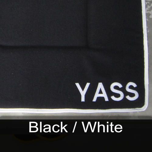 A black towel with the word yass on it