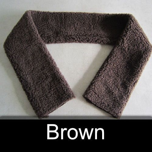 A brown scarf is sitting on a white surface