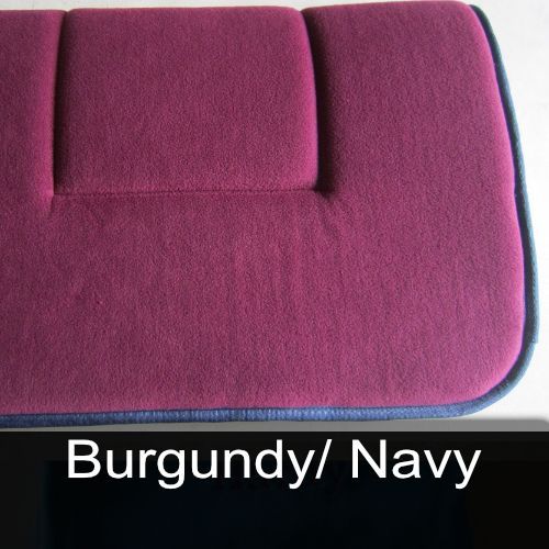 A close up of a burgundy and navy saddle pad