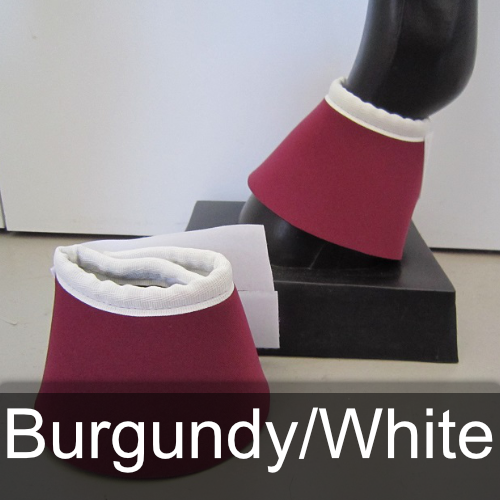 A pair of burgundy and white bell boots on a mannequin