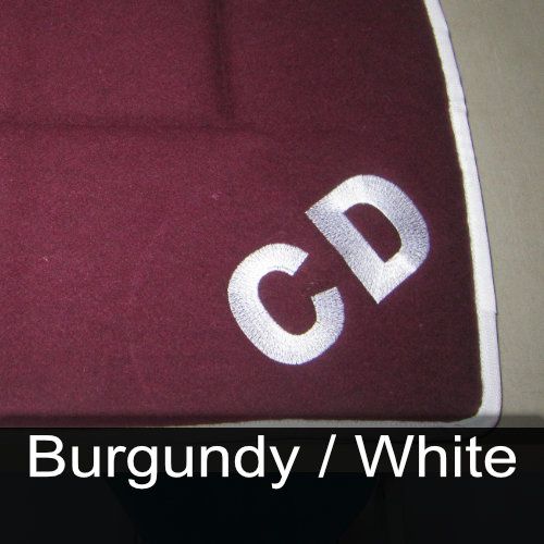 Burgundy and white hat with the letter cd embroidered on it