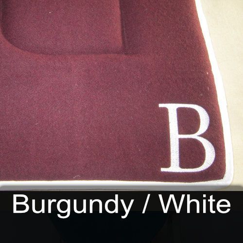 A burgundy and white item with the letter b on it