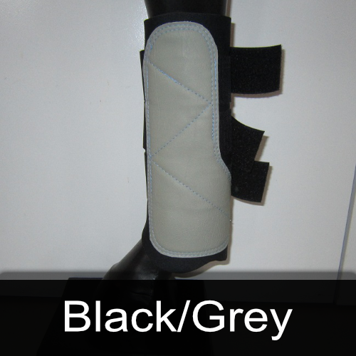 A pair of black and grey boots on a mannequin