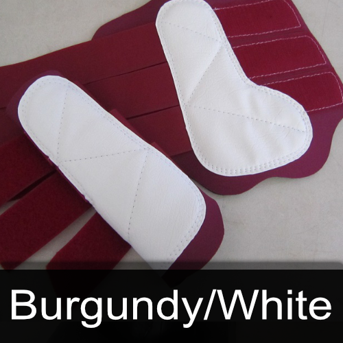 A pair of burgundy and white knee pads