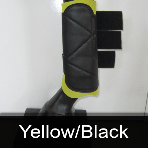 A pair of yellow and black boots on a mannequin