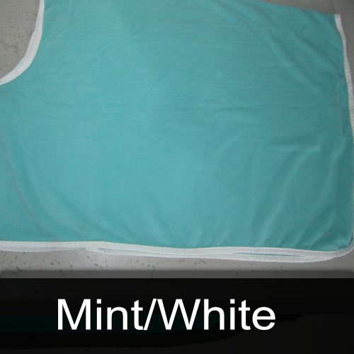 A mint / white blanket with a white trim