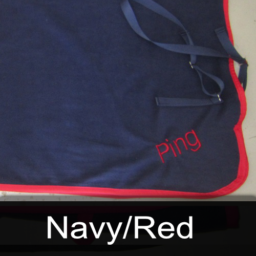 A blue blanket with the name ping embroidered on it