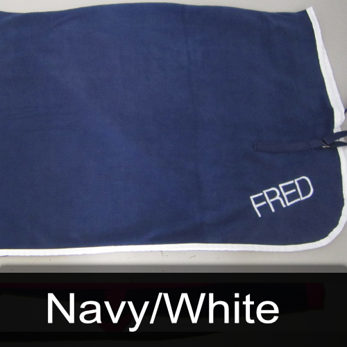 A blue towel with the name fred embroidered on it