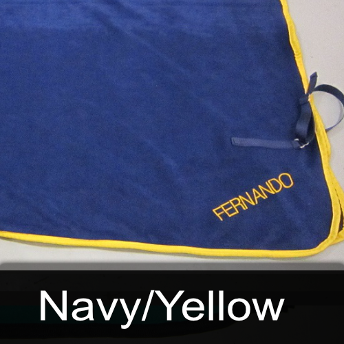 A blue blanket with the name fernando embroidered on it