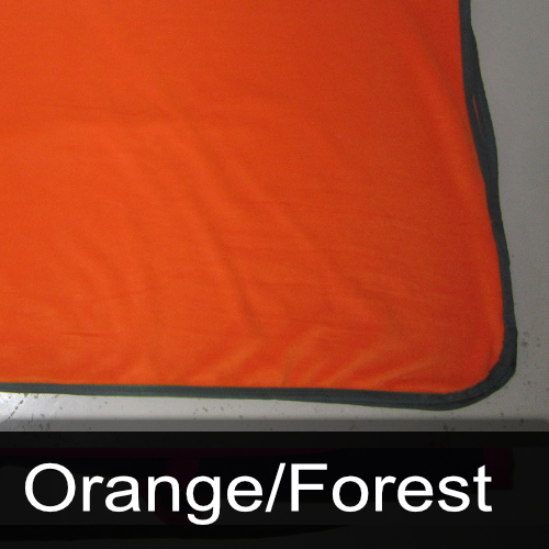 An orange blanket with the words orange / forest below it