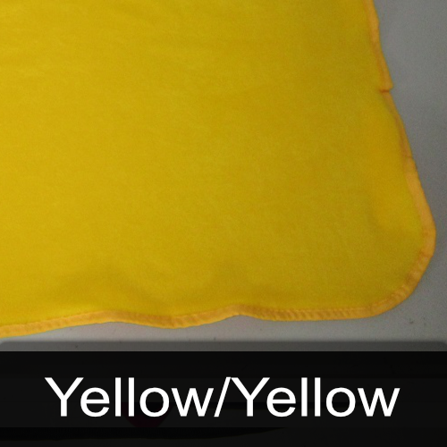 A close up of a yellow cloth with the words yellow / yellow below it
