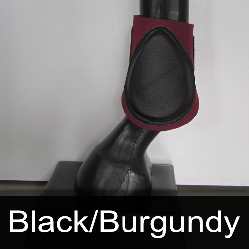 A picture of a black and burgundy horse boot