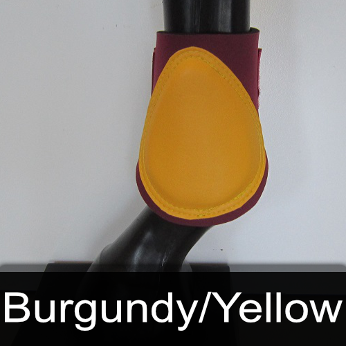 A picture of a horse 's leg in burgundy and yellow