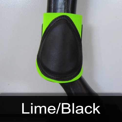 A pair of lime and black boots on a horse 's leg