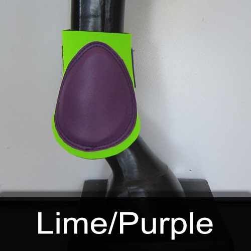 A lime and purple boot is on a horse 's leg.
