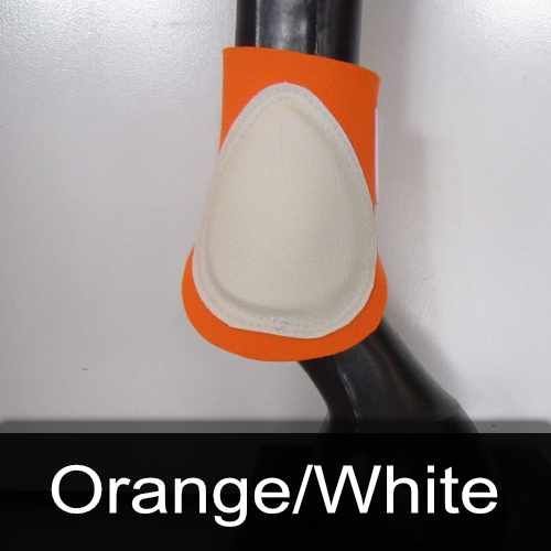 A close up of an orange and white boot on a horse 's leg.