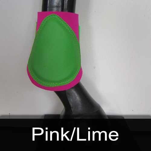 A pink and green boot is on a horse 's leg.