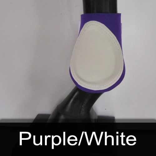 A close up of a purple and white boot on a horse 's leg.