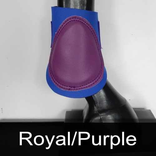 A purple and blue boot is on a horse 's leg.