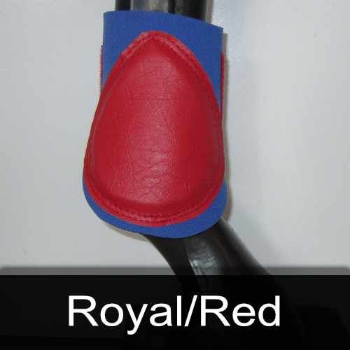 A red and blue boot is on a horse 's leg.