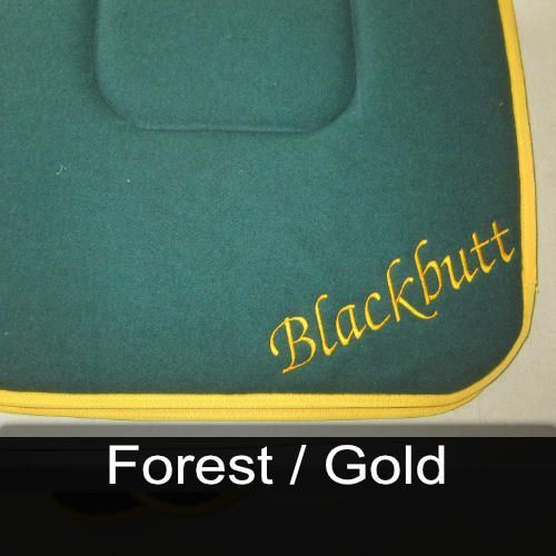 A green seat cushion with the name blackbutt embroidered on it