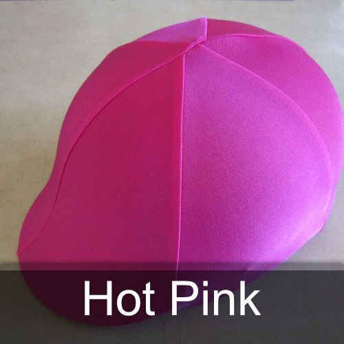 A hot pink baseball cap is sitting on a table
