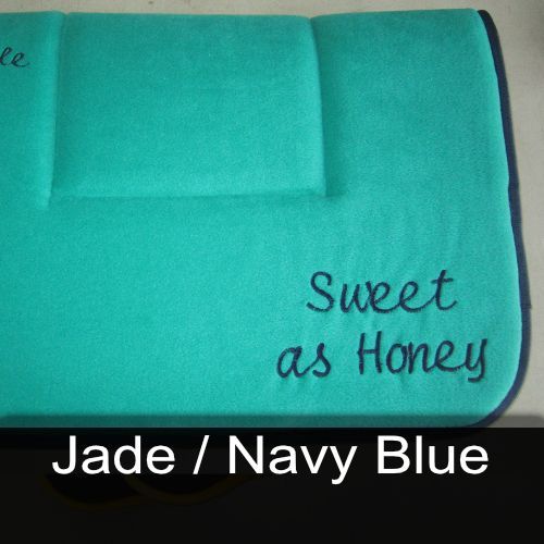A blue towel with the words sweet as honey embroidered on it