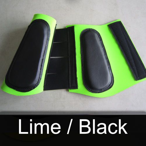 A pair of lime and black leg protectors
