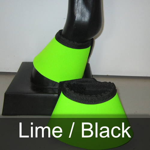 A pair of lime and black bell boots on a mannequin