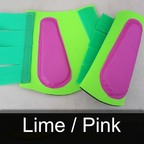 A pair of lime and pink horse boots on a white surface