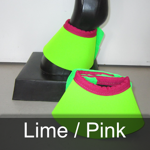 A pair of lime / pink shoes on a mannequin