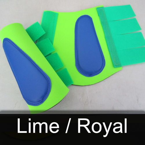 A pair of lime and blue brushing boots on a table