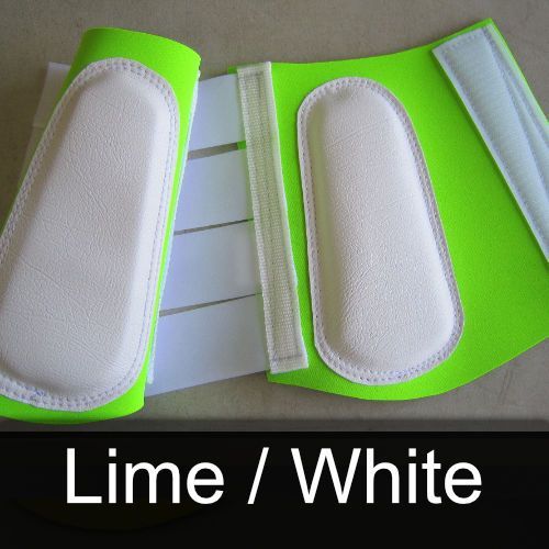 A pair of lime and white leg protectors