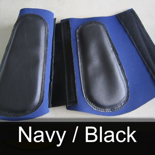 A pair of blue and black boots with the words navy / black below them